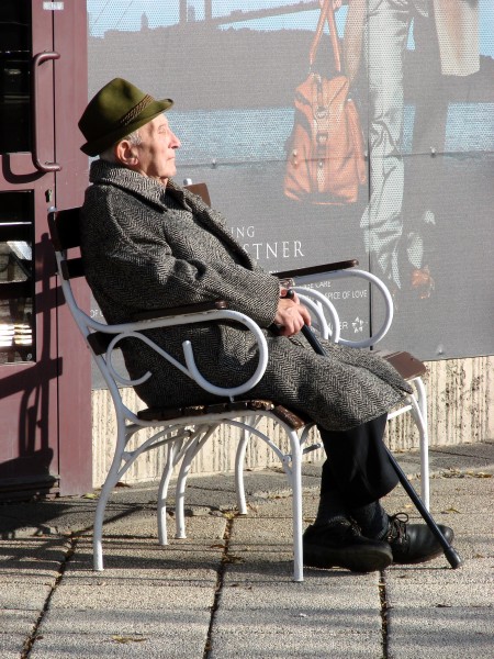 Elderly Man Soaks Up the Sun along the Danube - Pest Side - Budapest - Hungary