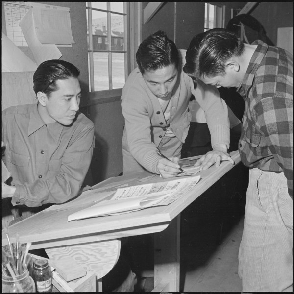 Heart Mountain Relocation Center, Heart Mountain, Wyoming. Three young artists in the Poster Shop d . . . - NARA - 539156