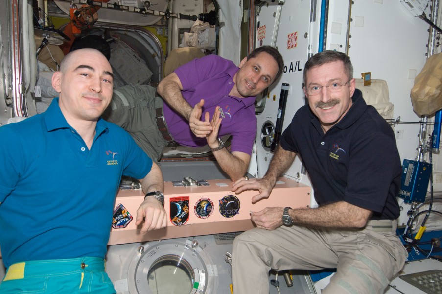 ISS-30 crew with Expedition 30 patch in the Unity node