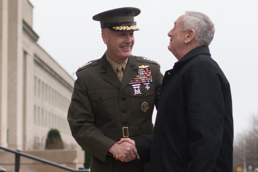 James Mattis is greeted by Gen. Joseph F. Dunford Jr., in Arlington, Jan. 21, 2017