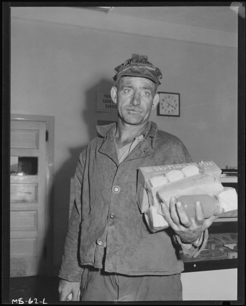 Louis Shafer, miner, with armful of groceries bought at company store. Pittsburgh Coal Company, Westland Mine... - NARA - 540250