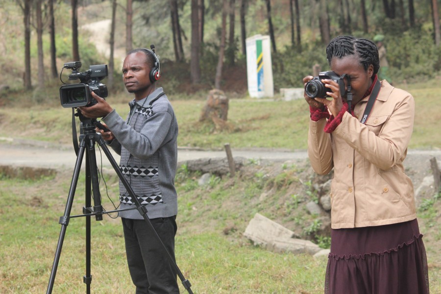 Photographer and video shooter at work