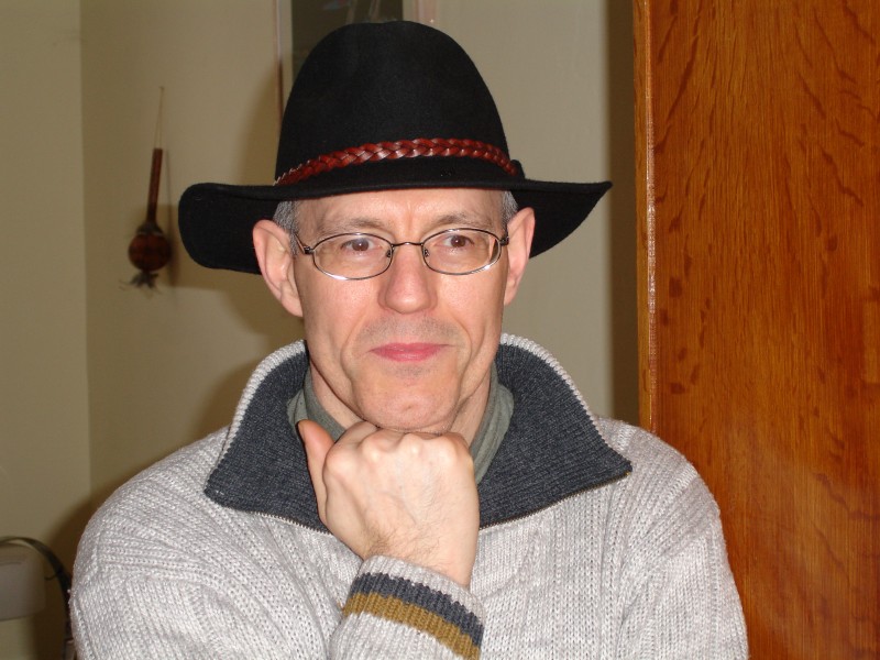 Portrait Christian Janssen avec chapeau