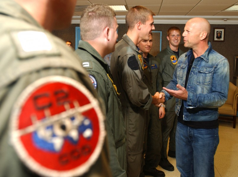 US Navy 020725-N-5319A-515 Actor Bruce Willis meets with Navy air crew
