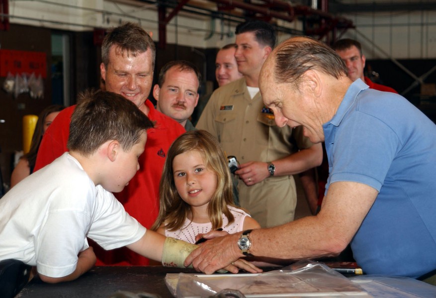 US Navy 030614-N-3122S-002 Robert Duvall autographs the cast for the son of a Sailor