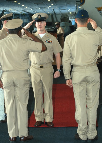 US Navy 030916-N-2838C-502 As a newly pinned Chief Petty Officer, Chief Aviation Ordnanceman Todd Snedeker, requests permission to enter the mess