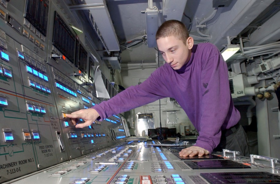 US Navy 031118-N-4768W-038 Aviation Boatswain's Mate 3rd Class Jason Normand, from Marksville, La., operates a jet fuel control console aboard USS John C. Stennis (CVN 74)
