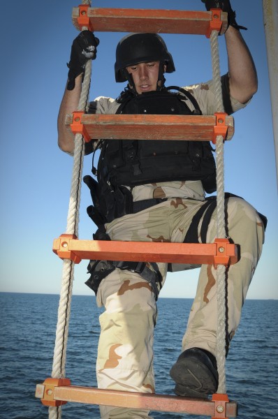 US Navy 091116-N-1522S-011 A Sailor climbs the Jacob's ladder during a visit, board, search and seizure exercise