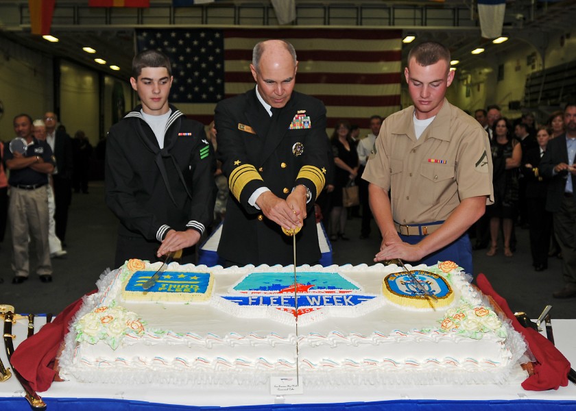 US Navy 101011-N-7282P-502 Sailors cut the cake at a U.S. 3rd Fleet reception aboard the amphibious assault ship USS Makin Island (LHD 8)