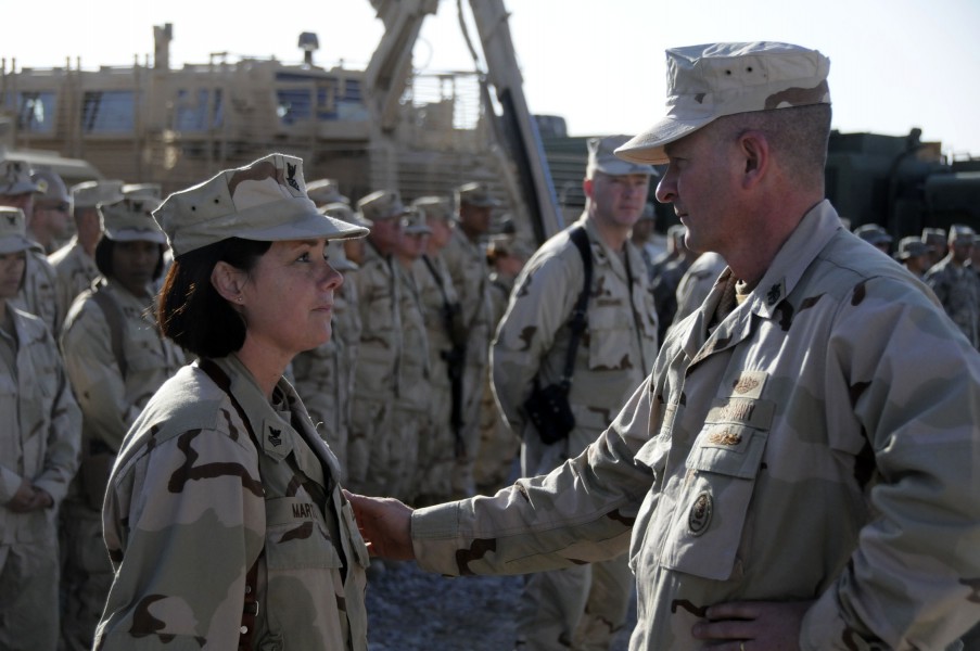 US Navy 110122-N-4345W-208 Master Chief Petty Officer of the Navy (MCPON) Rick D. West greets Hospital Corpsman 1st Class Starla Martin
