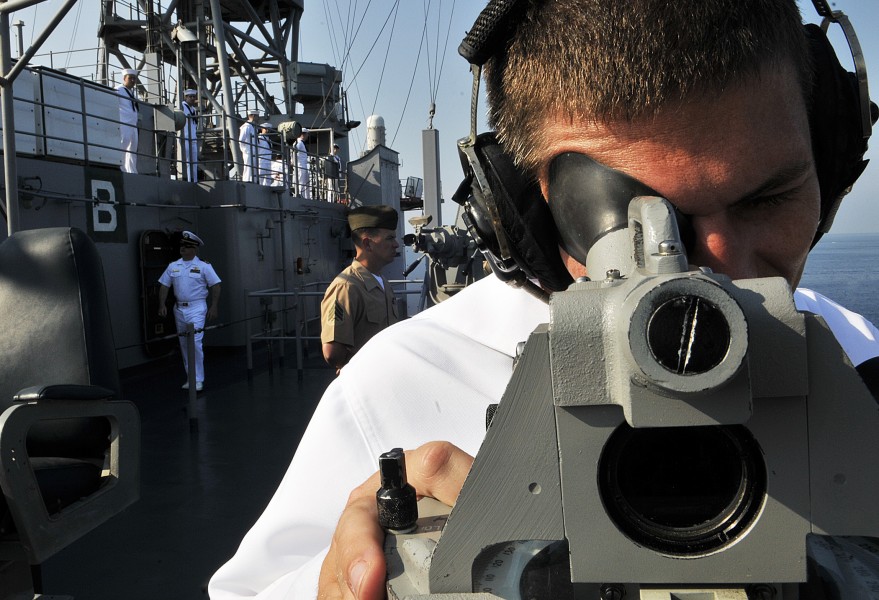 US Navy 110703-N-AG285-130 Quartermaster 3rd Class Christopher Koch uses a sound-powered telephone aboard USS Whidbey Island (LSD 41)