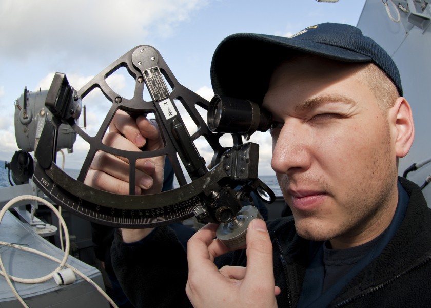 US Navy 111213-N-FI736-012 Ensign Thomas Early uses a stadimeter to find the distance