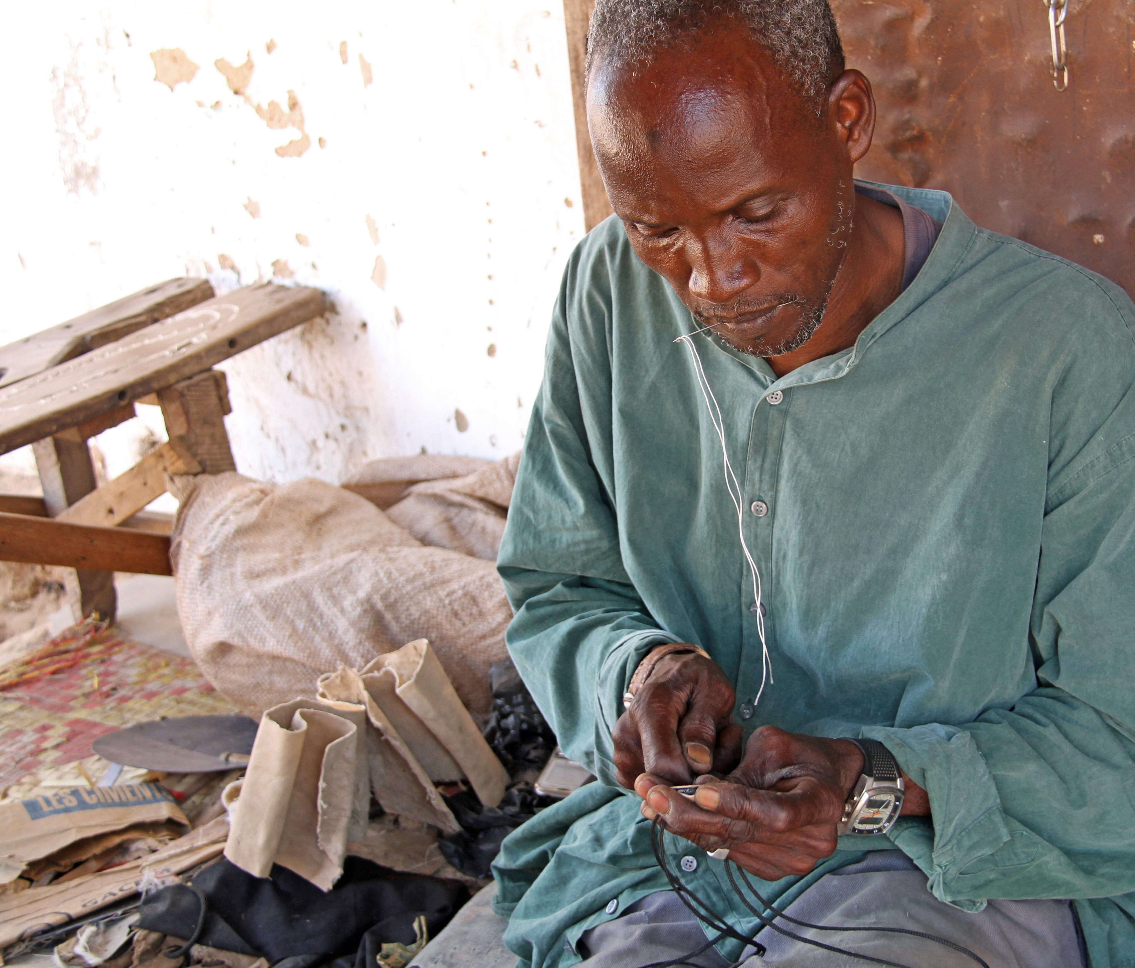 Reparing belts, bags, charms, etc. (11085113174)