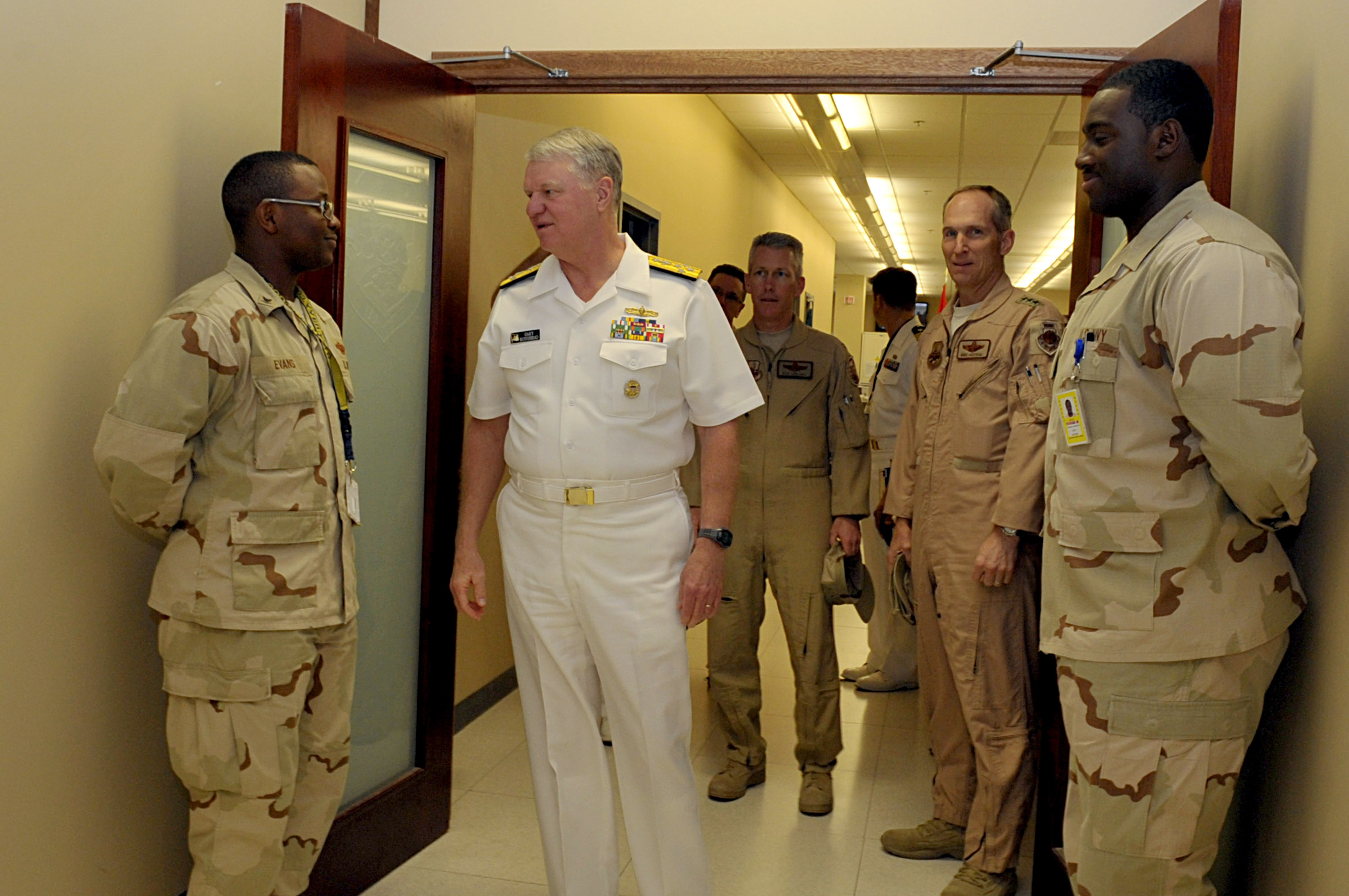 US Navy 100330-N-8273J-074 Chief of Naval Operations (CNO) Adm. Gary Roughead meets with Sailors assigned to the Combined Air Operations Center at Al Udied Airbase, Qatar