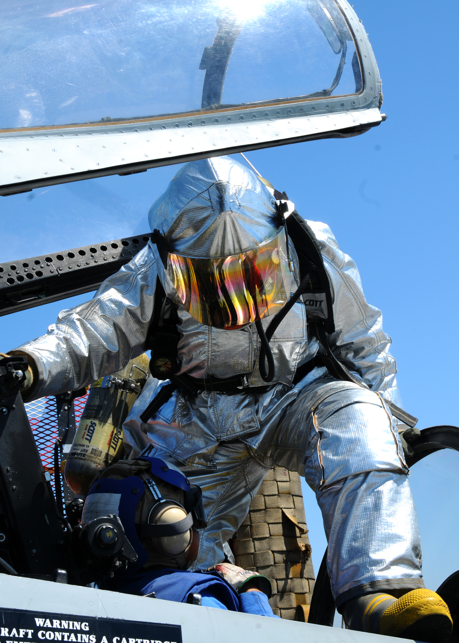US Navy 100829-N-7908T-047 A Sailor assigned to the air department crash and salvage division aboard the aircraft carrier USS George H.W. Bush (CVN 77) performs a rescue drill on the ship's flight deck