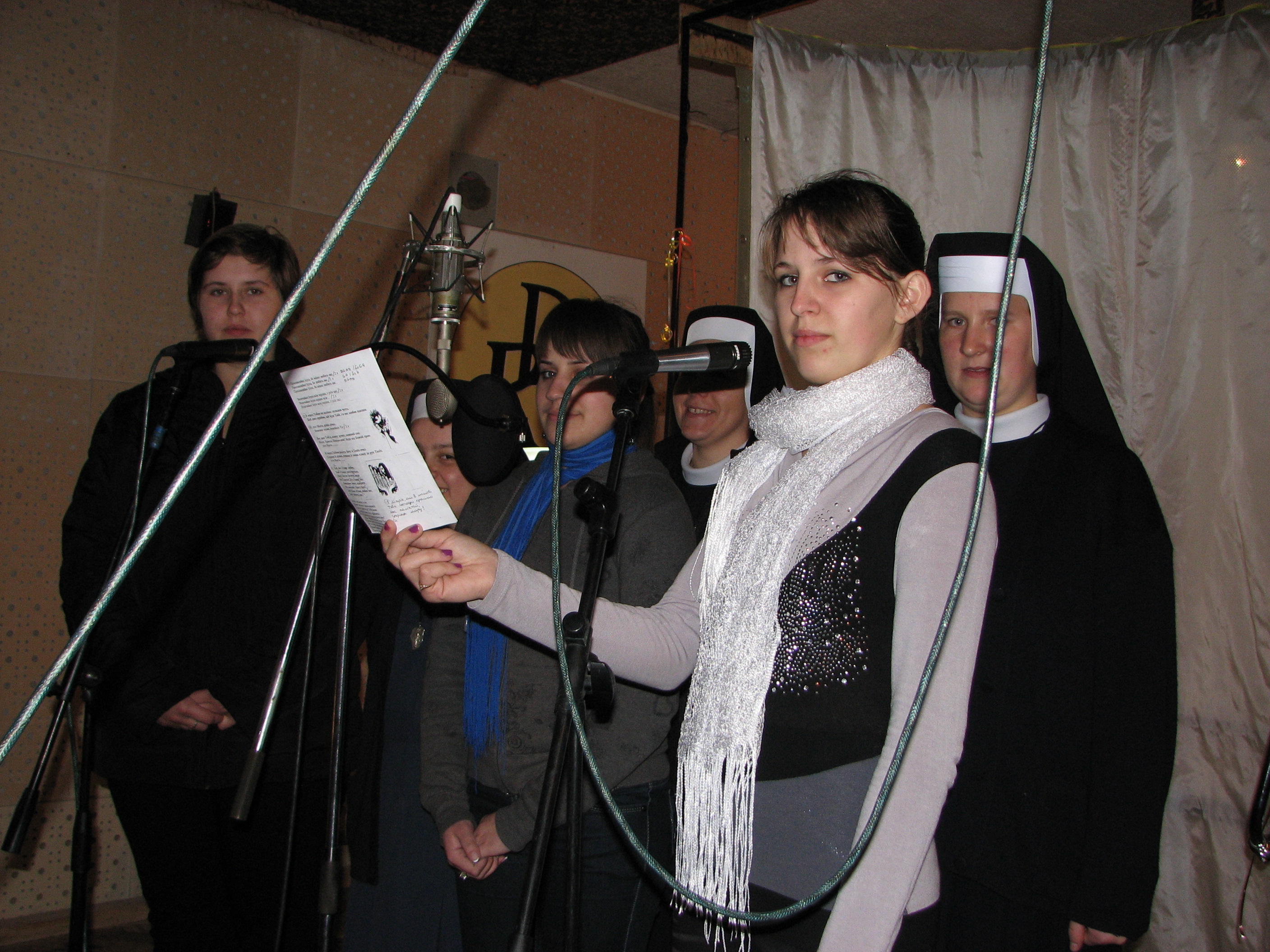 Catholic nuns and girls singing in a record studio in Lviv, Ukraine - recording a Christian music CD, picture 9.