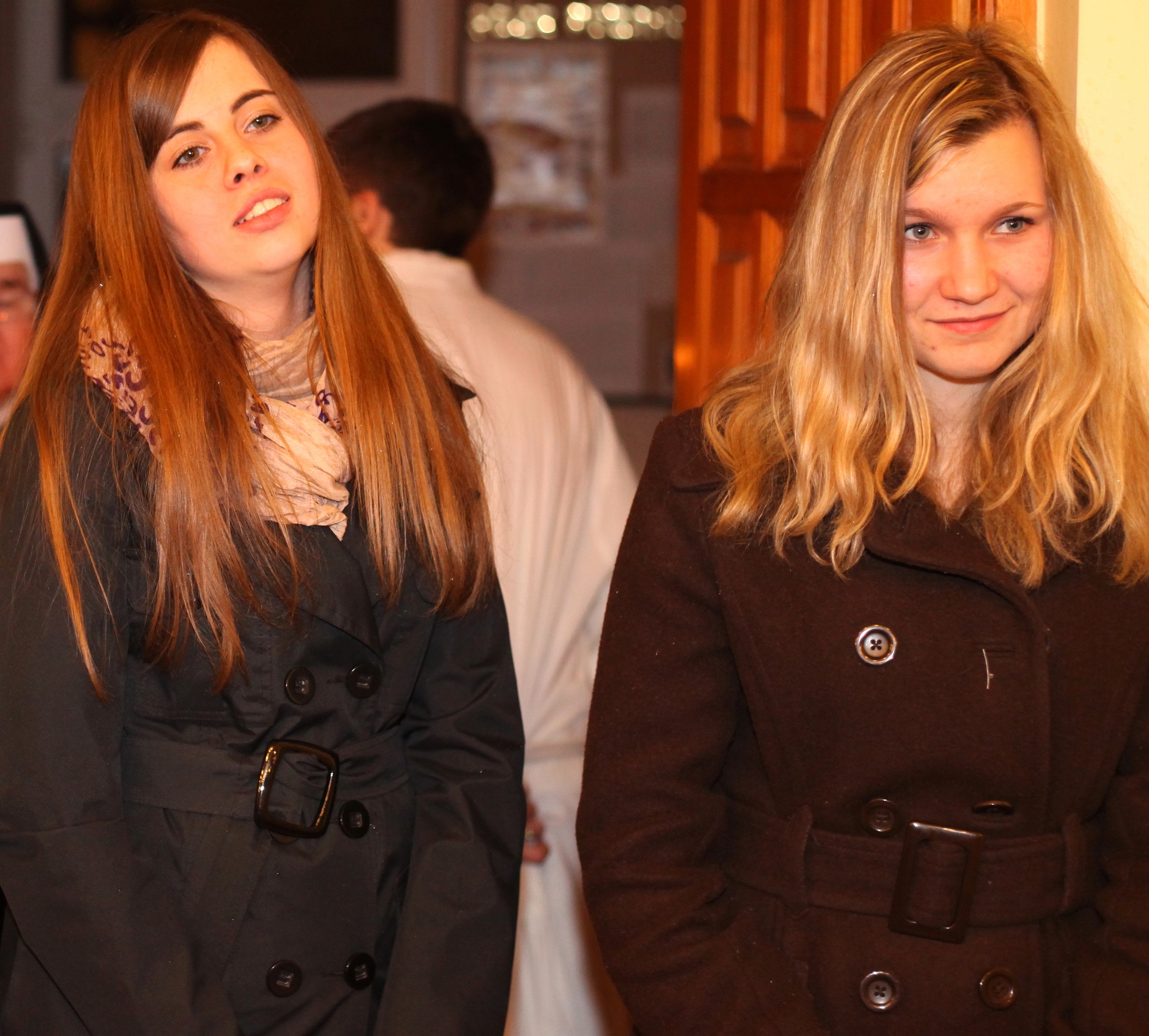 two beautiful Catholic girls in a Church