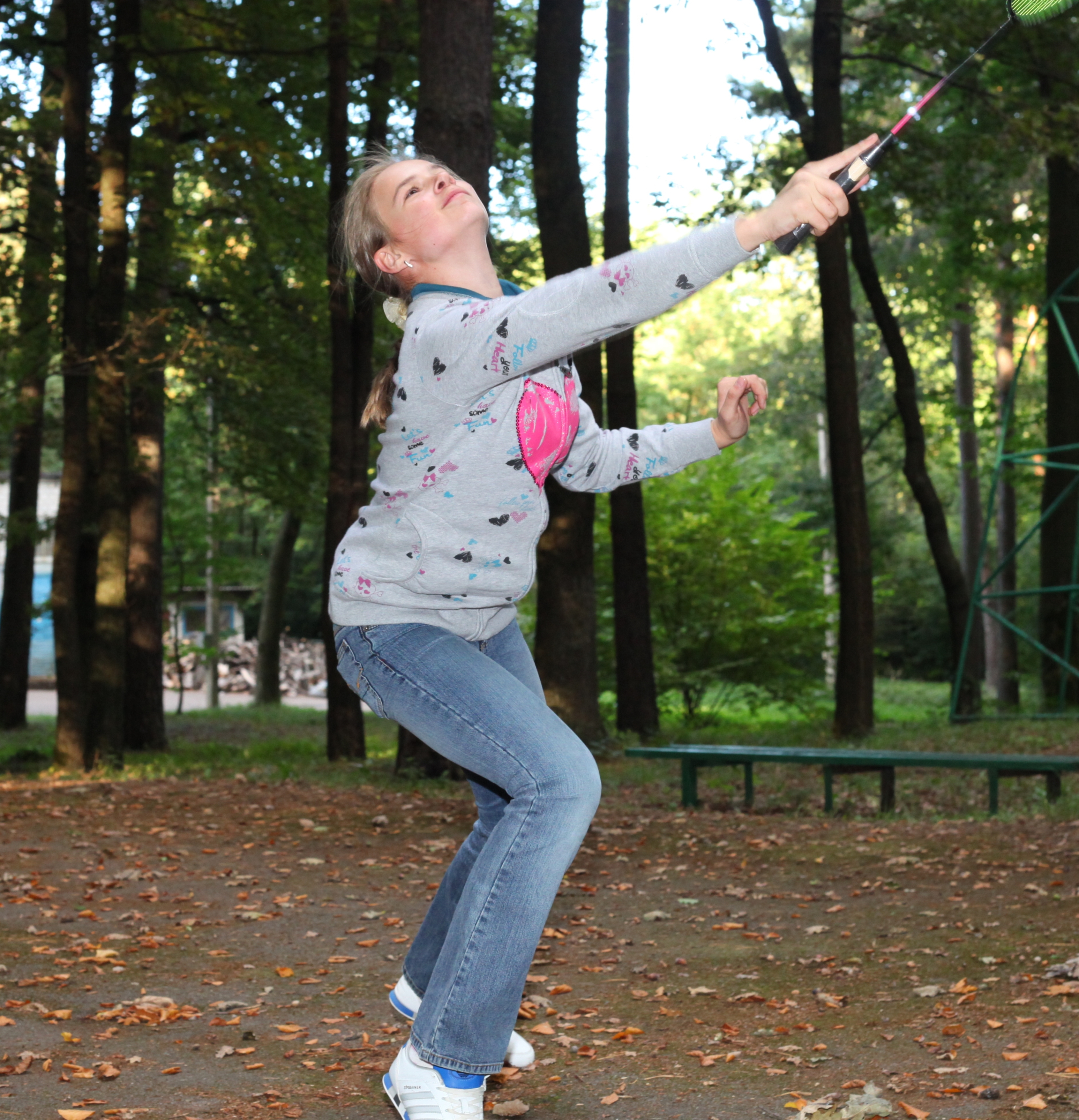 a beautiful appealing Catholic girl playing badminton, picture 21