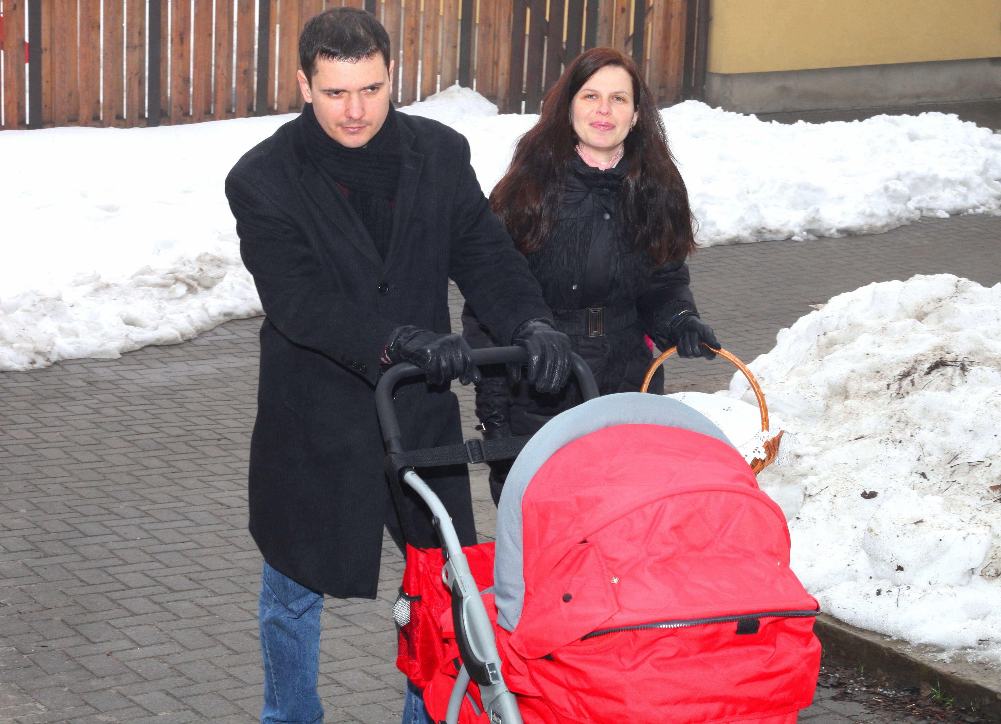 a beautiful Catholic family near a Church, picture 1