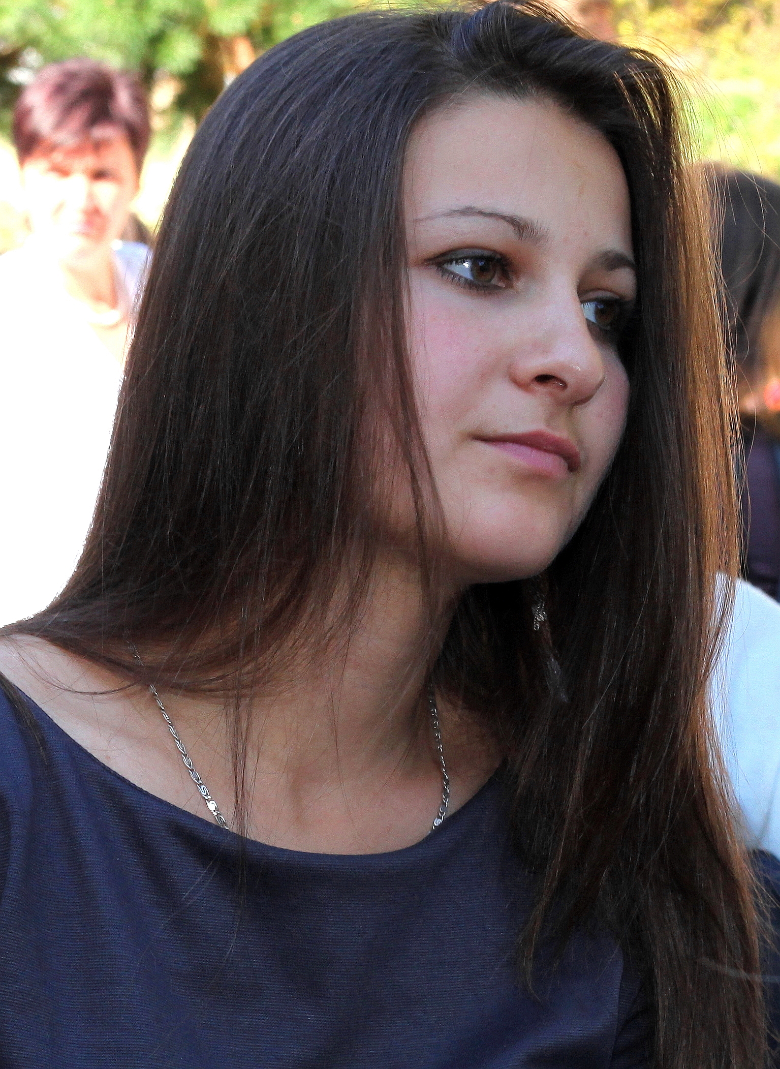 a pretty brunette Catholic girl near a Church, photo 29
