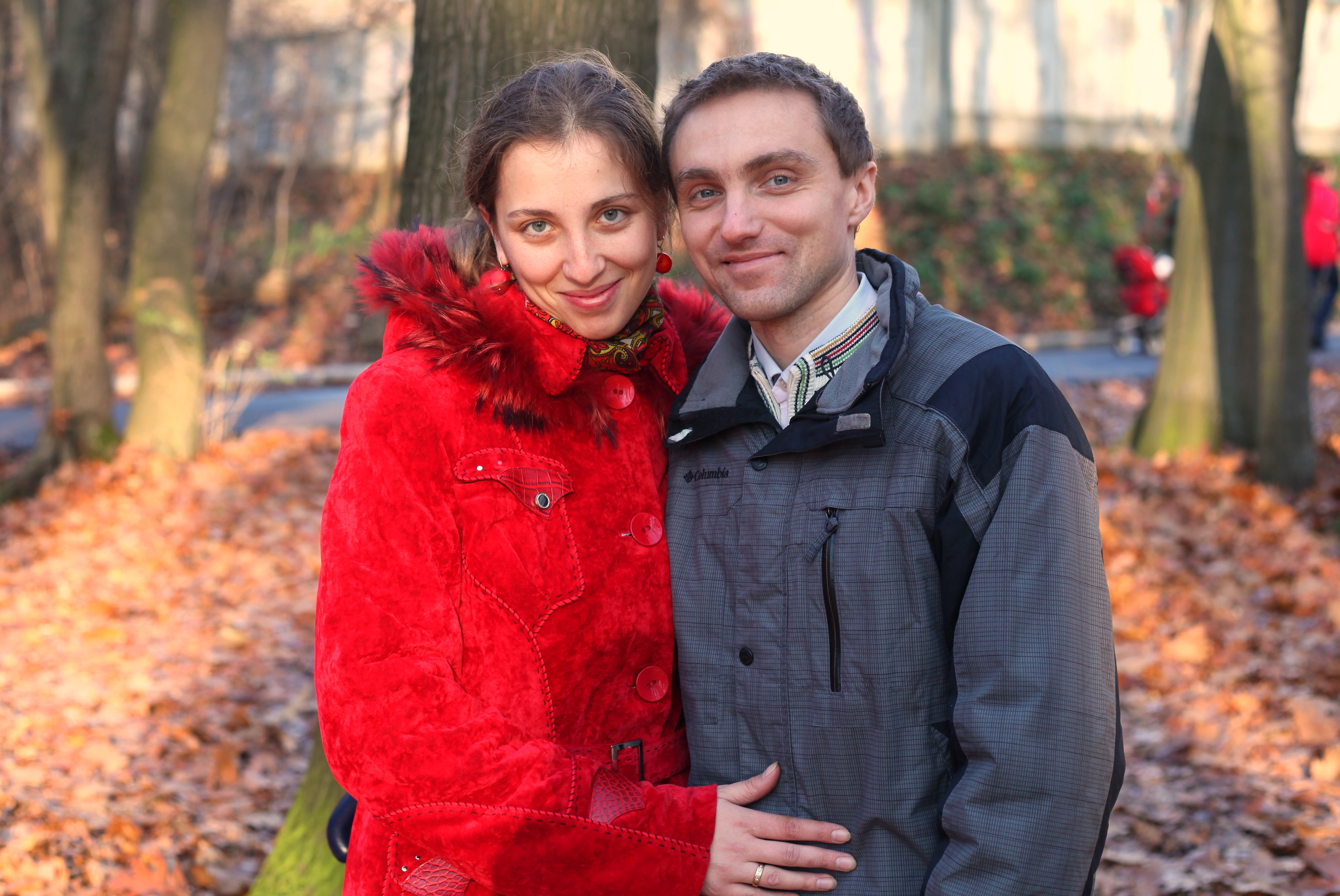 a beautiful Catholic wife with her husband in a park, photo 3