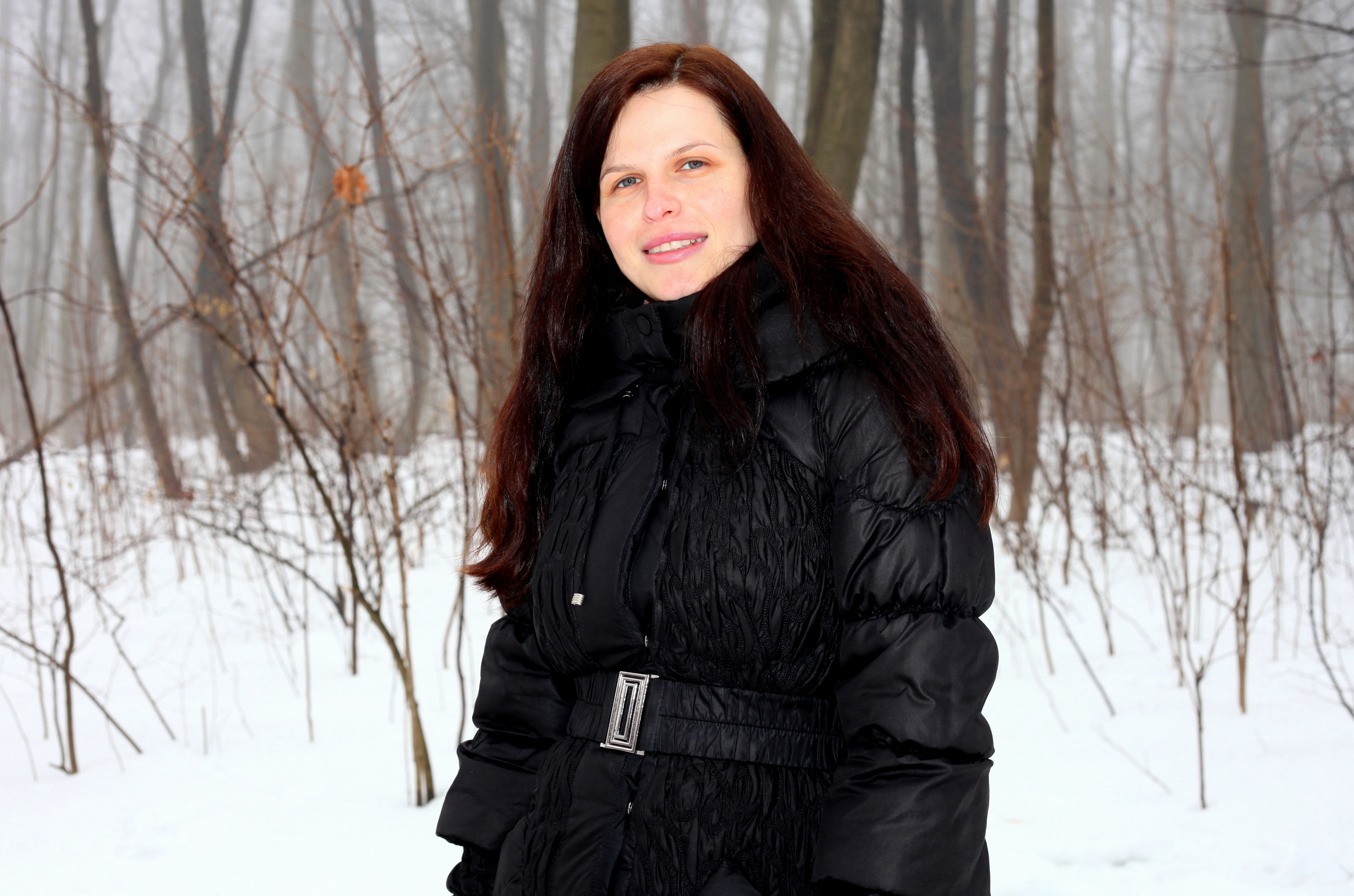 an amazingly beautiful charming Catholic woman in a forest, picture 5