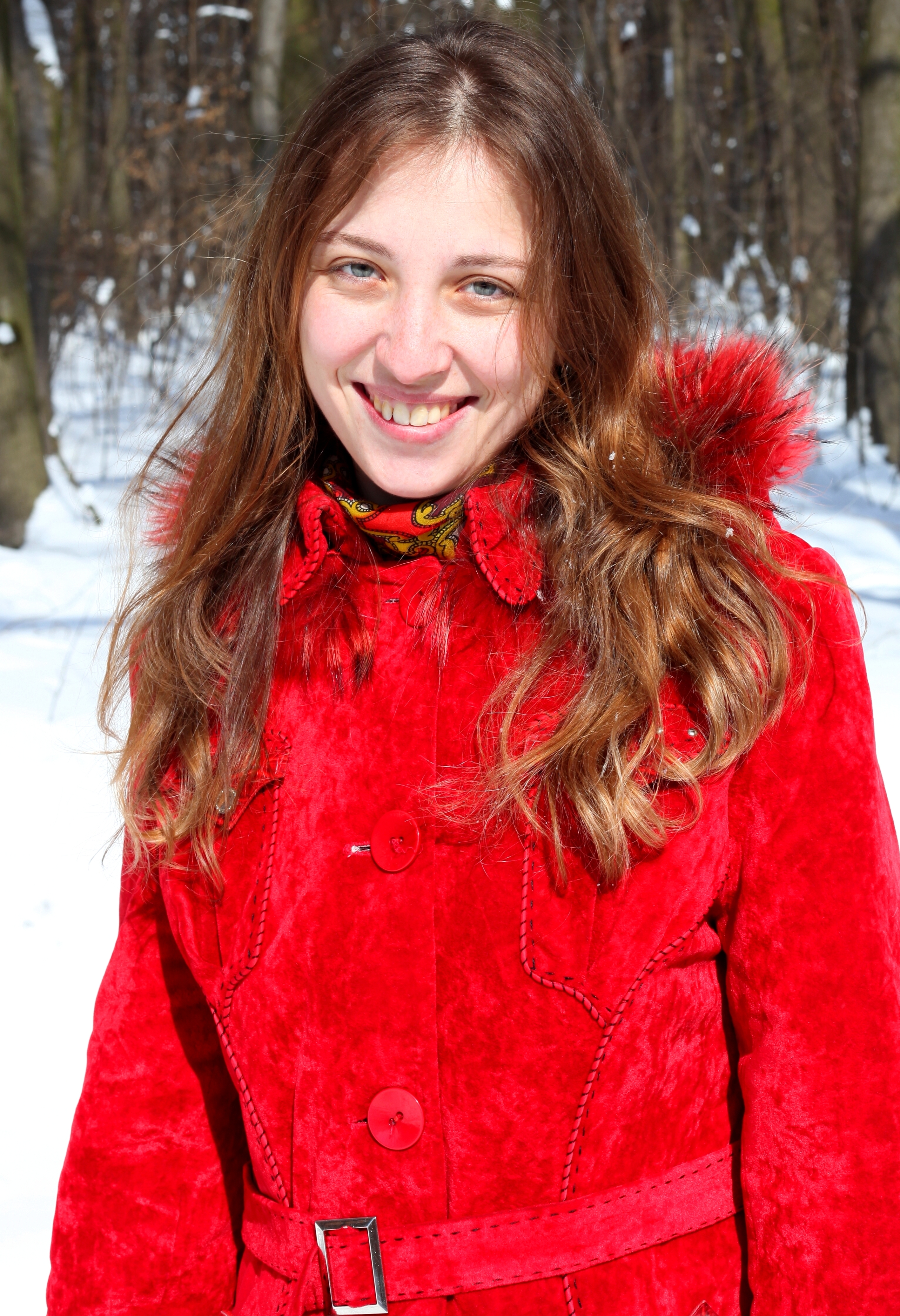 a charming beautiful attractive young Catholic woman in a snowy forest, photo 4