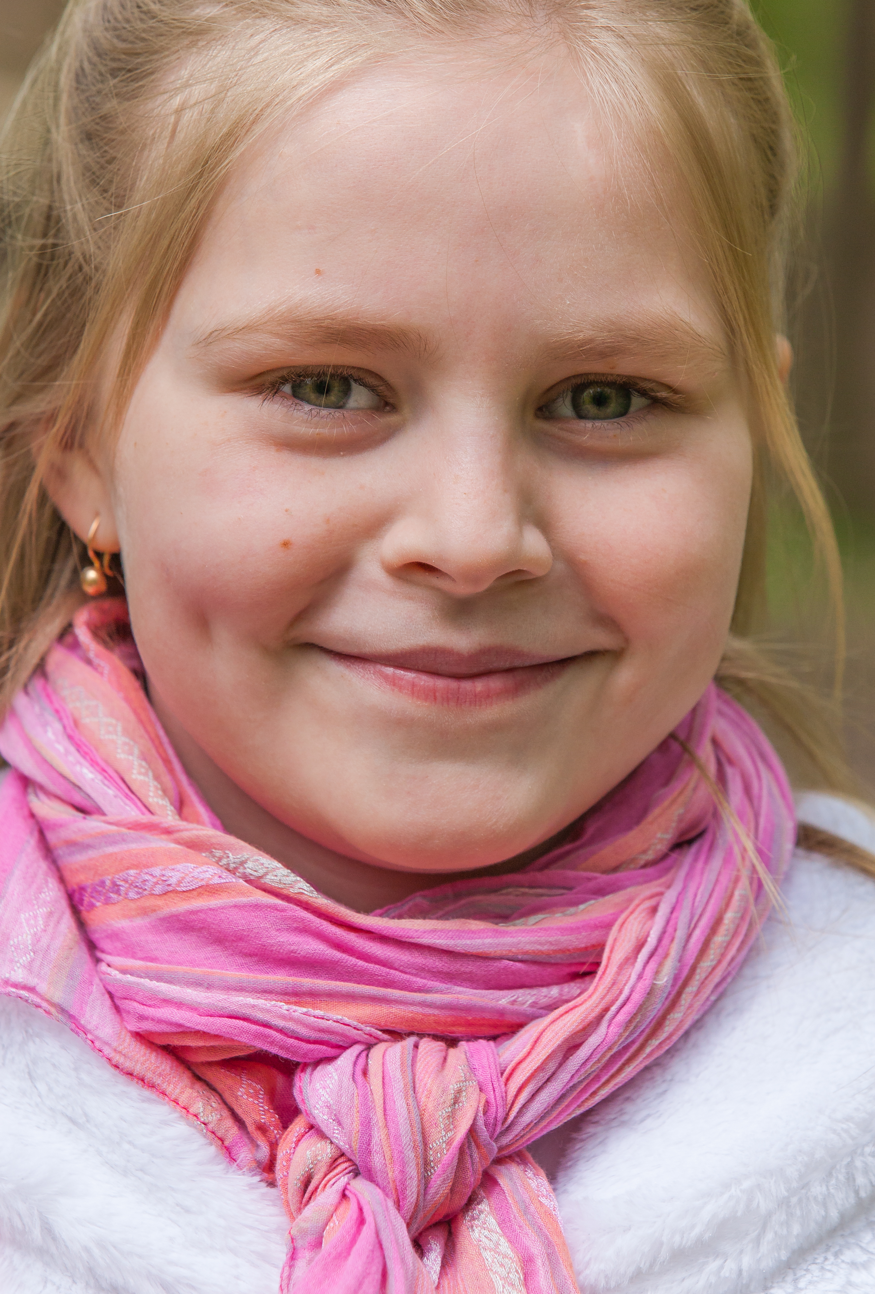 a cute Roman-Catholic blond child girl photographed in April 2014, portrait 2/29
