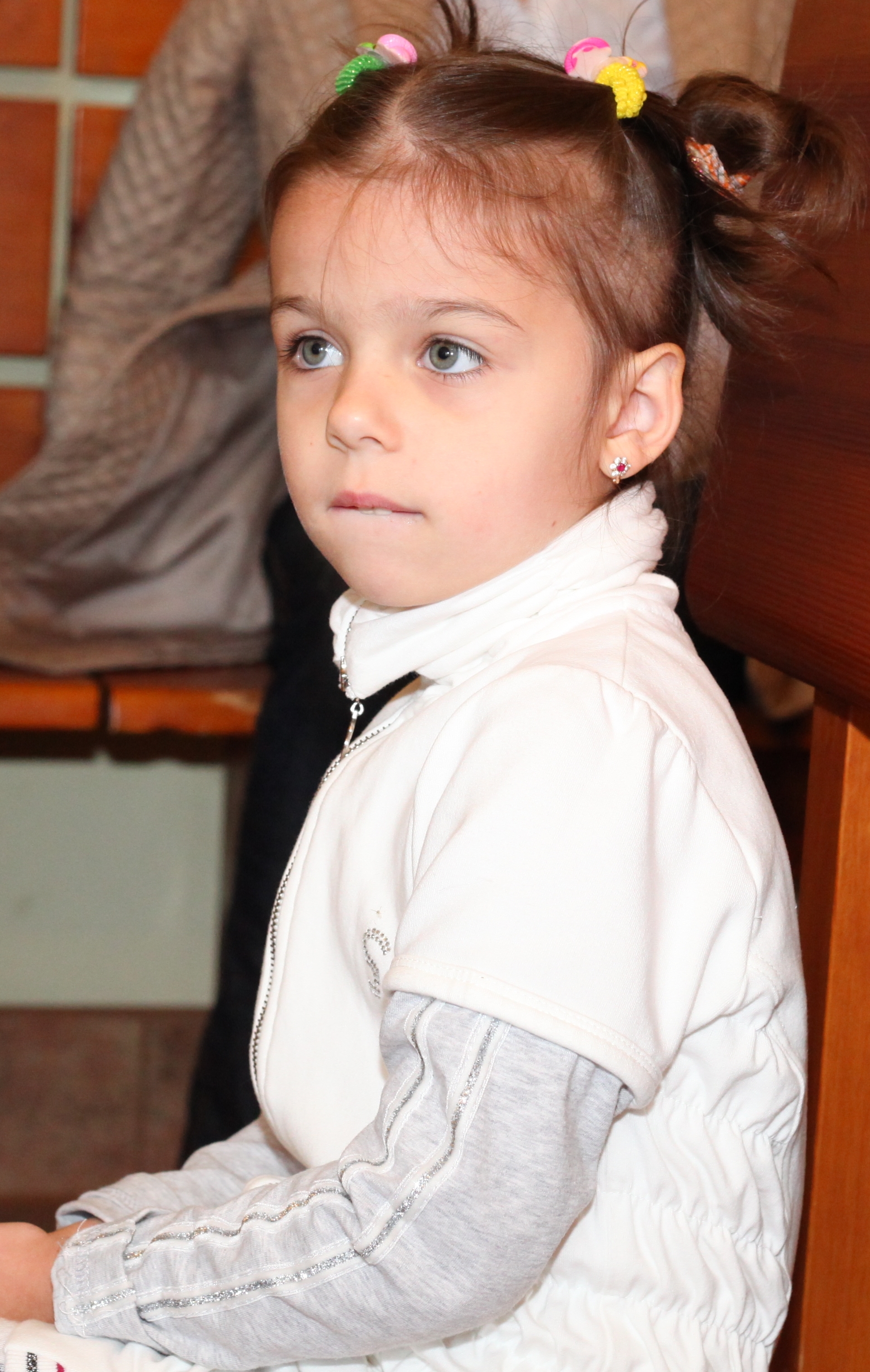 a child girl in a Catholic Church