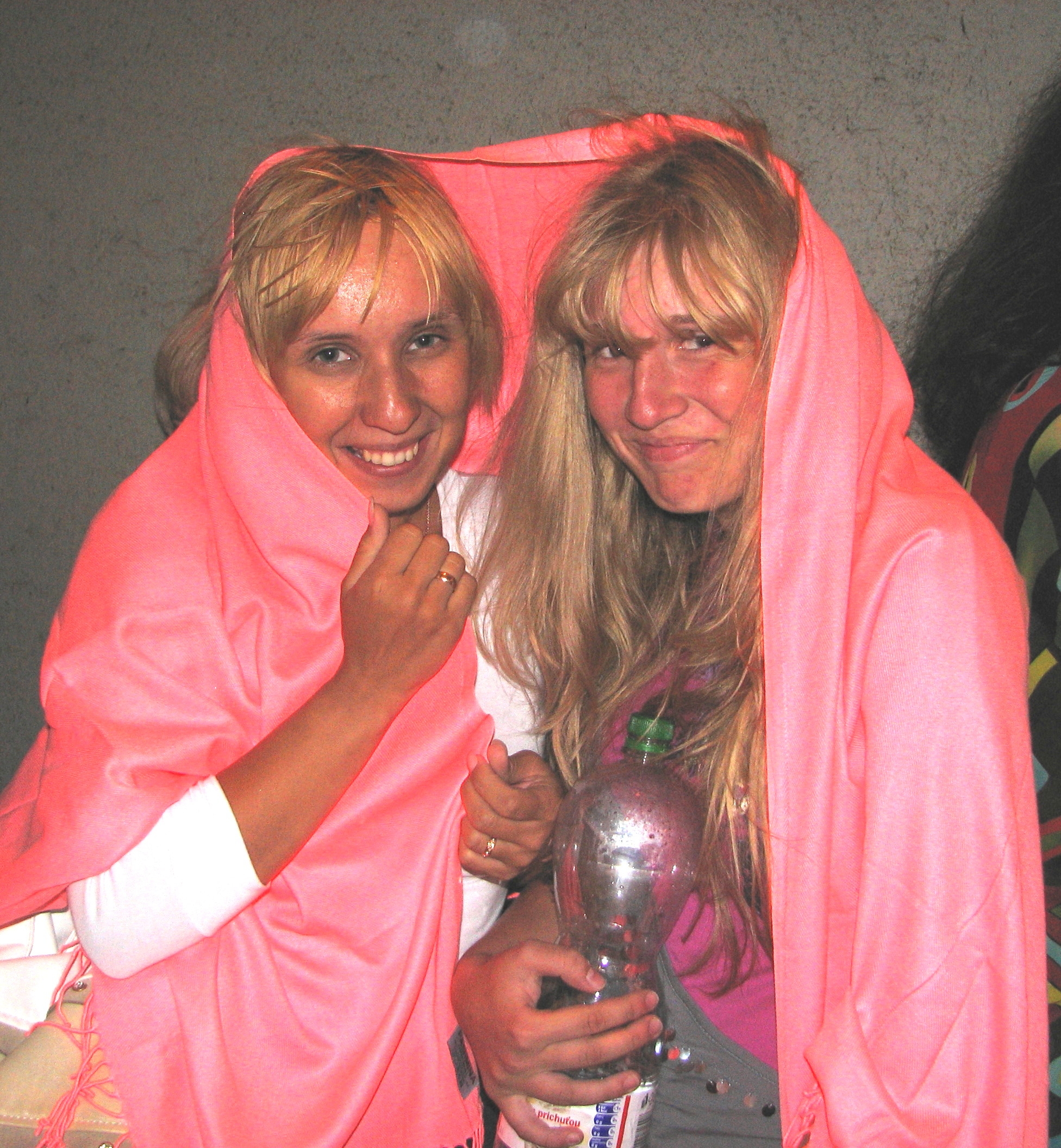 Two blond chicks hiding from rain - picture 6, cropped and edited