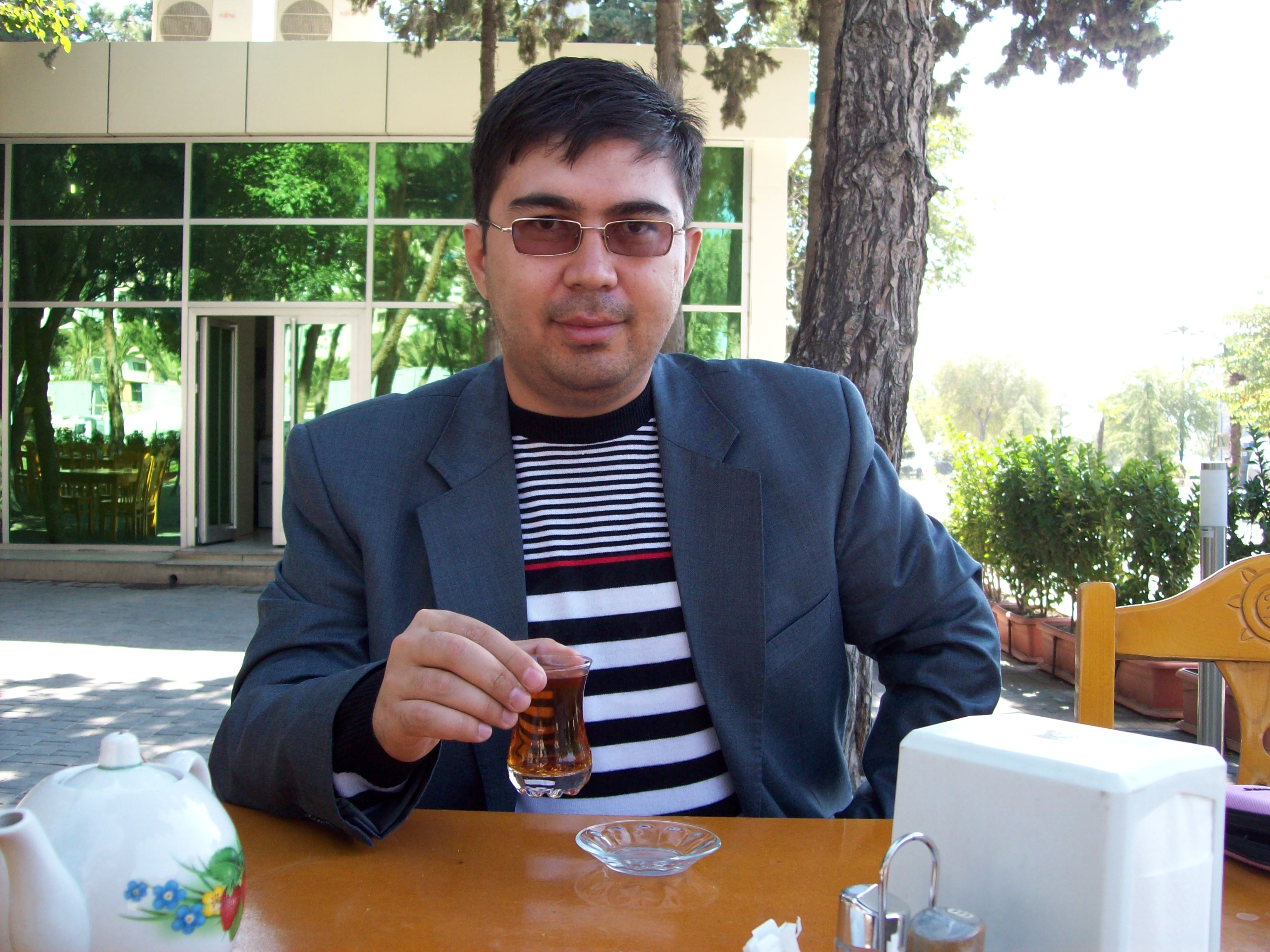 Azerbaijanian cup of tea from uzbek hands