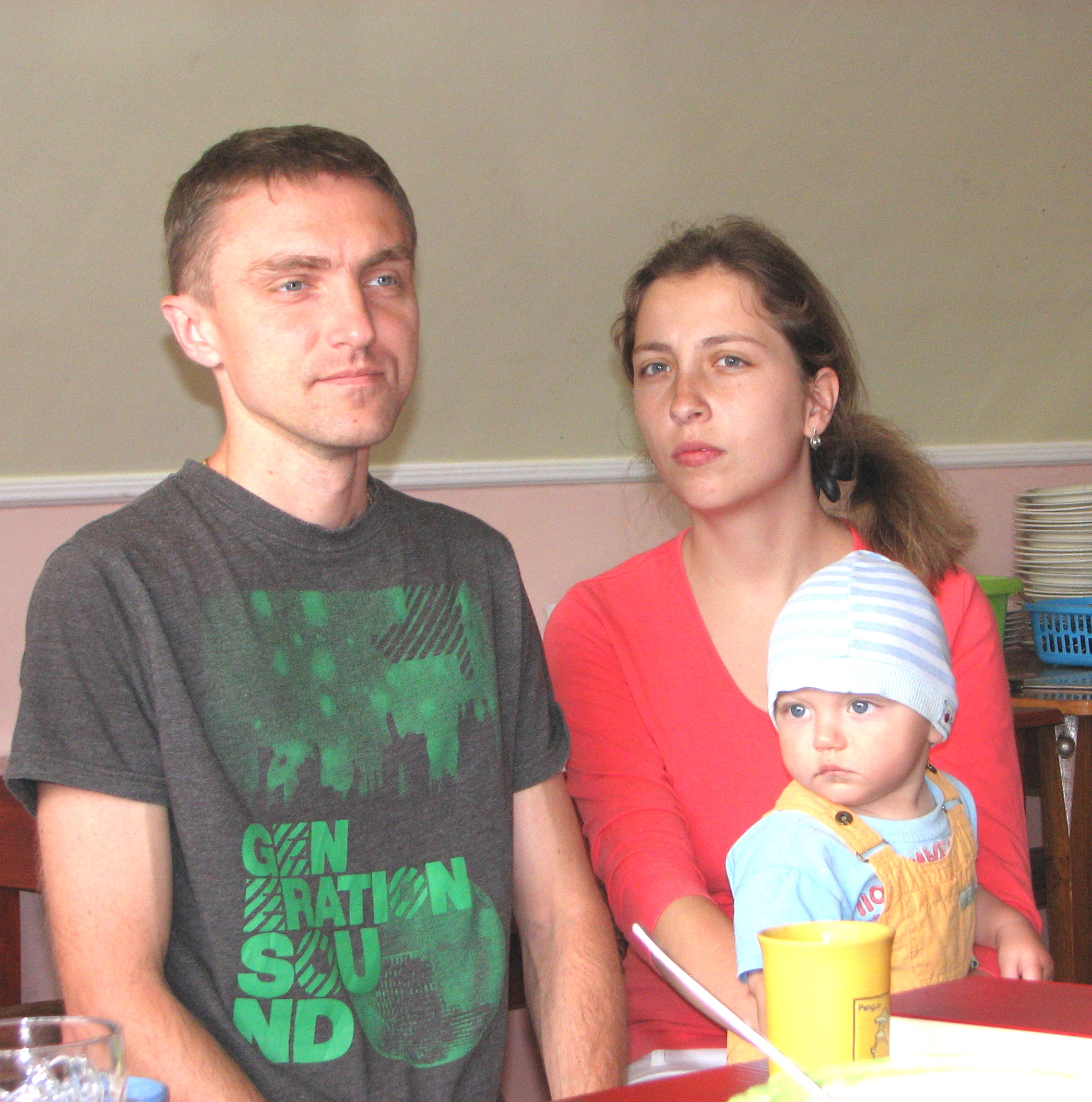 A married couple with kid: a young Catholic family, picture 2