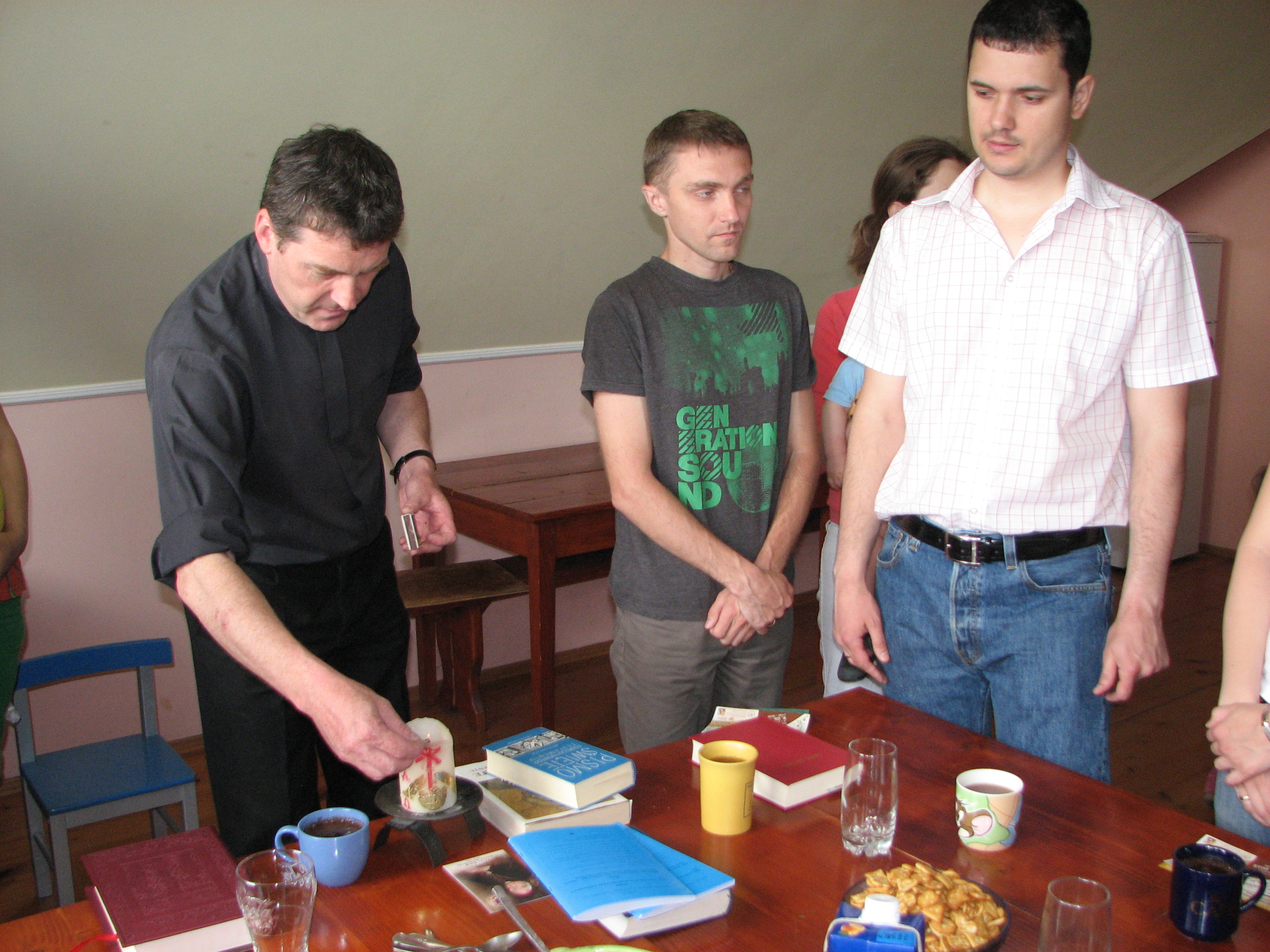 Priest (left) with people at a meeting of Catholic married couples, picture 3