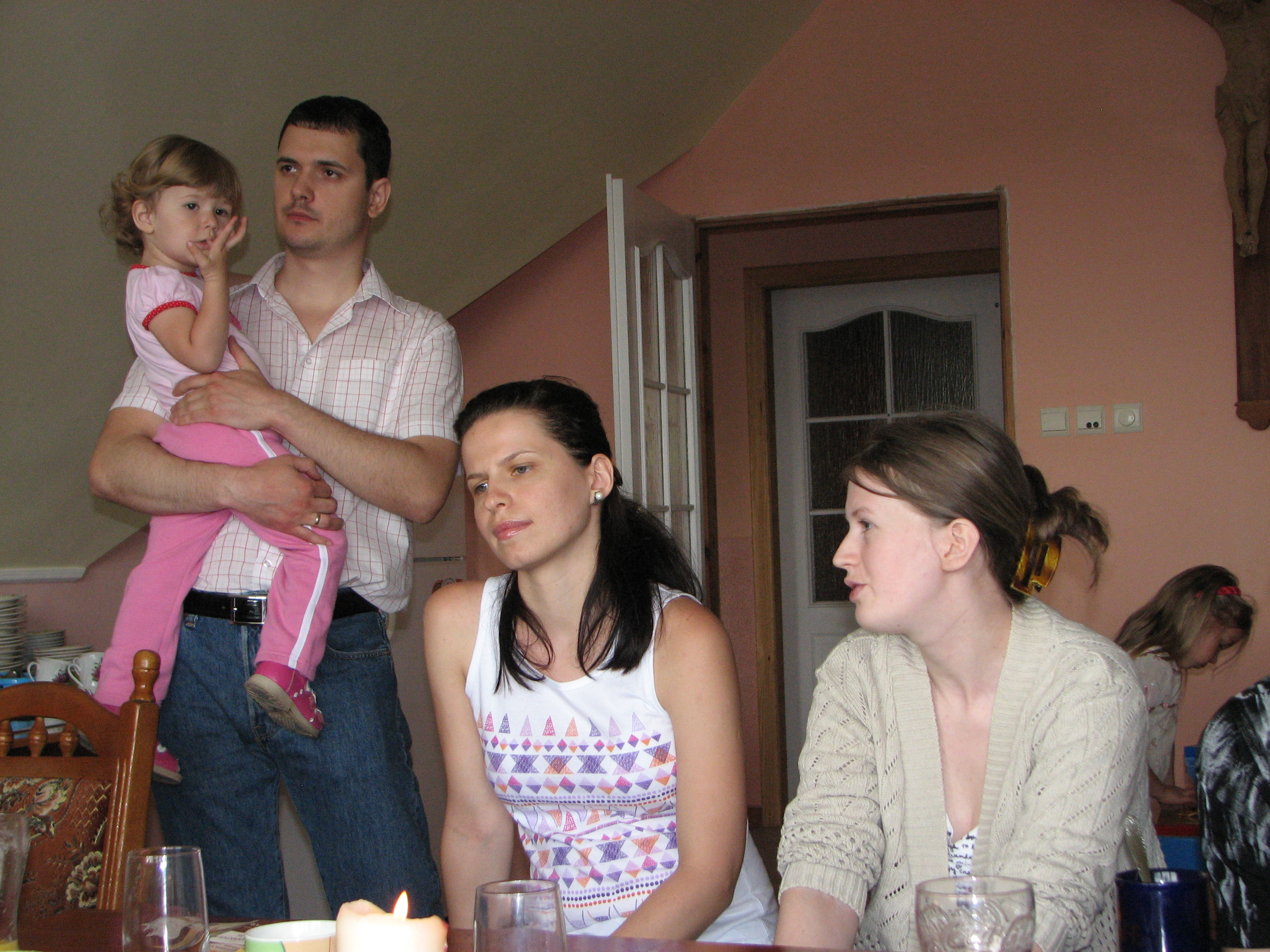 A man with kid and pretty women at a meeting of Catholic married couples, picture 24