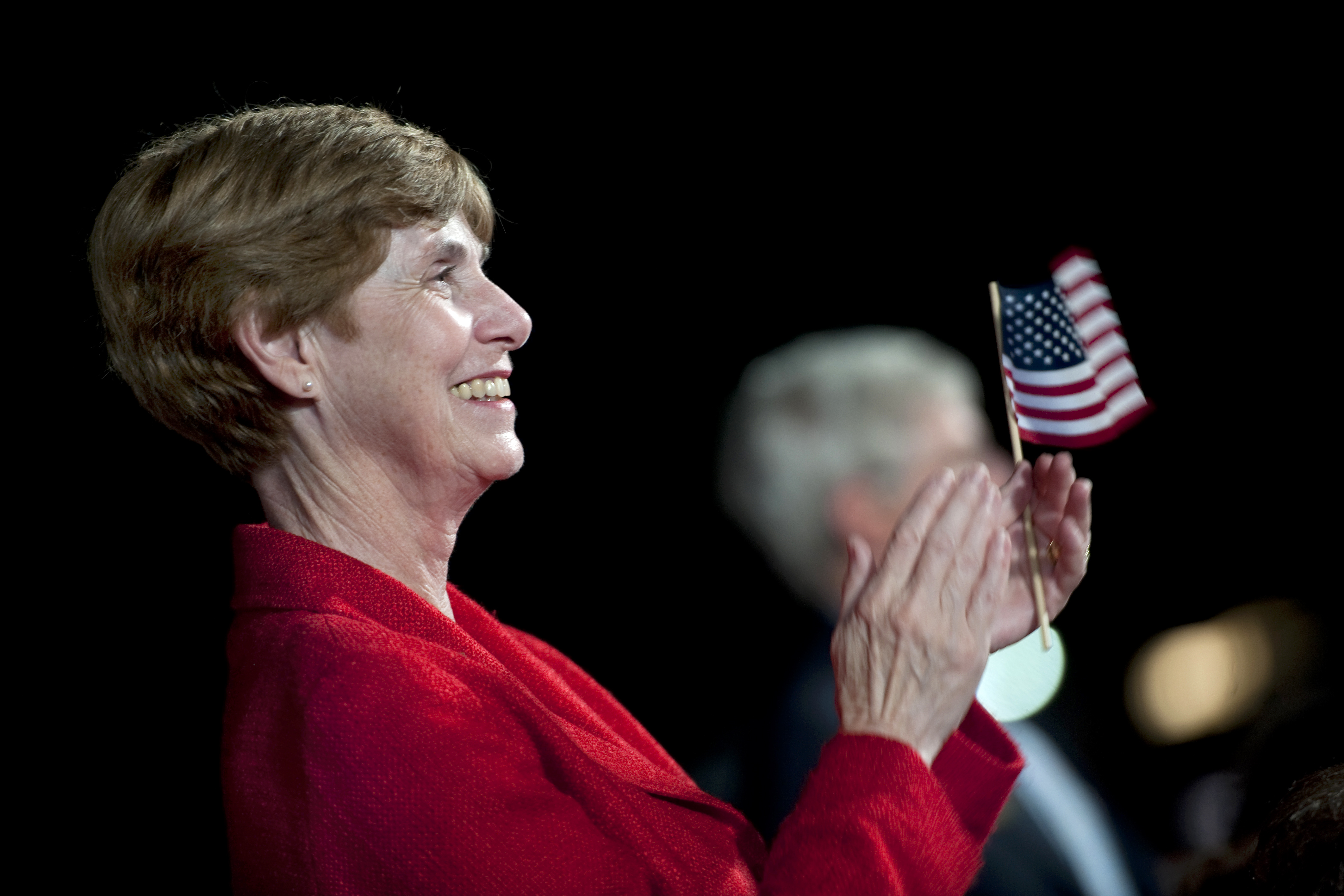 Deborah Mullen claps during the playing of the Armed Service Medley, 2011