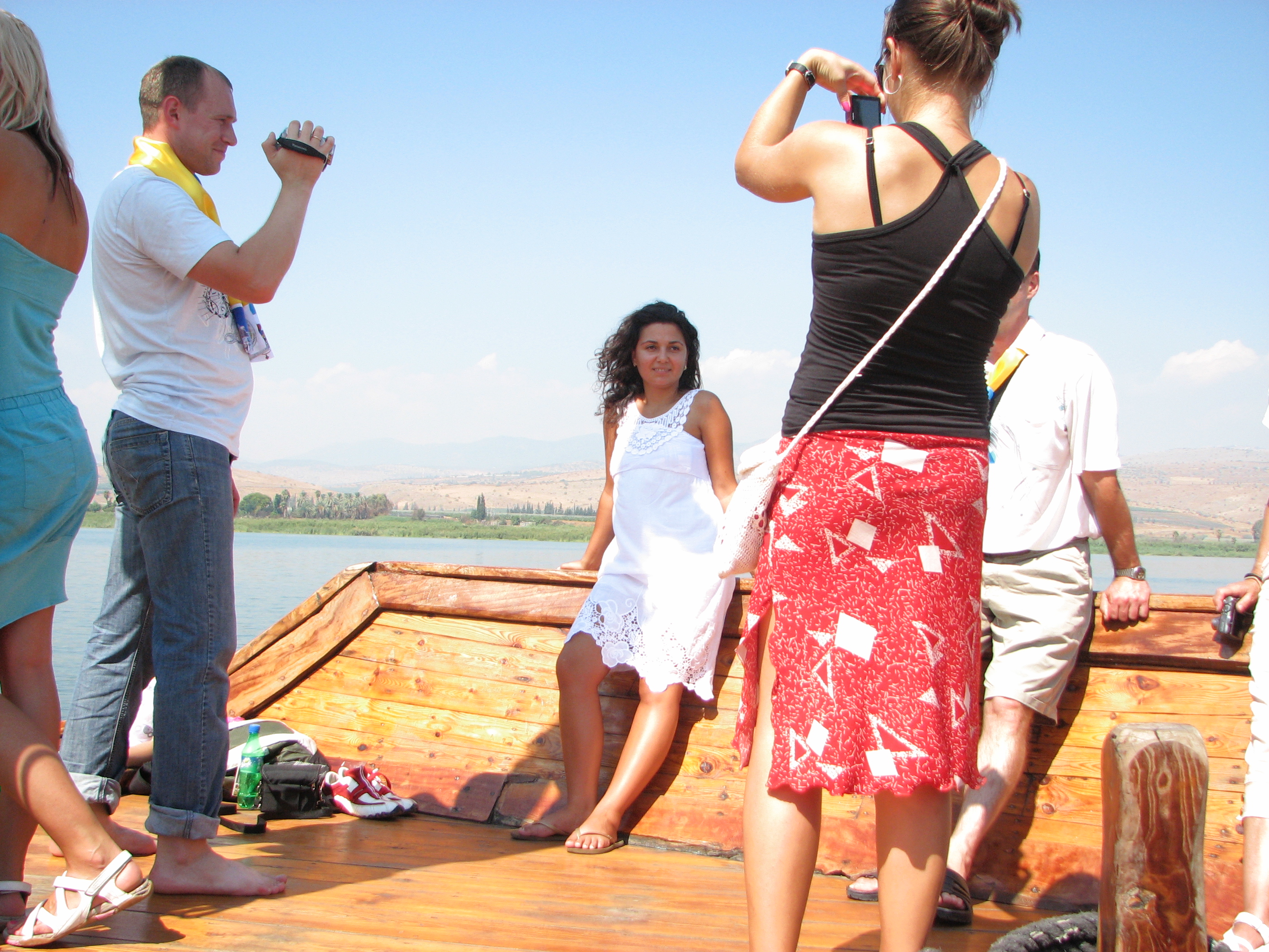 Christian pilgrims taking photos on a boat on the Galilean Sea (Lake) in Israel (where Jesus Christ preached), picture 11