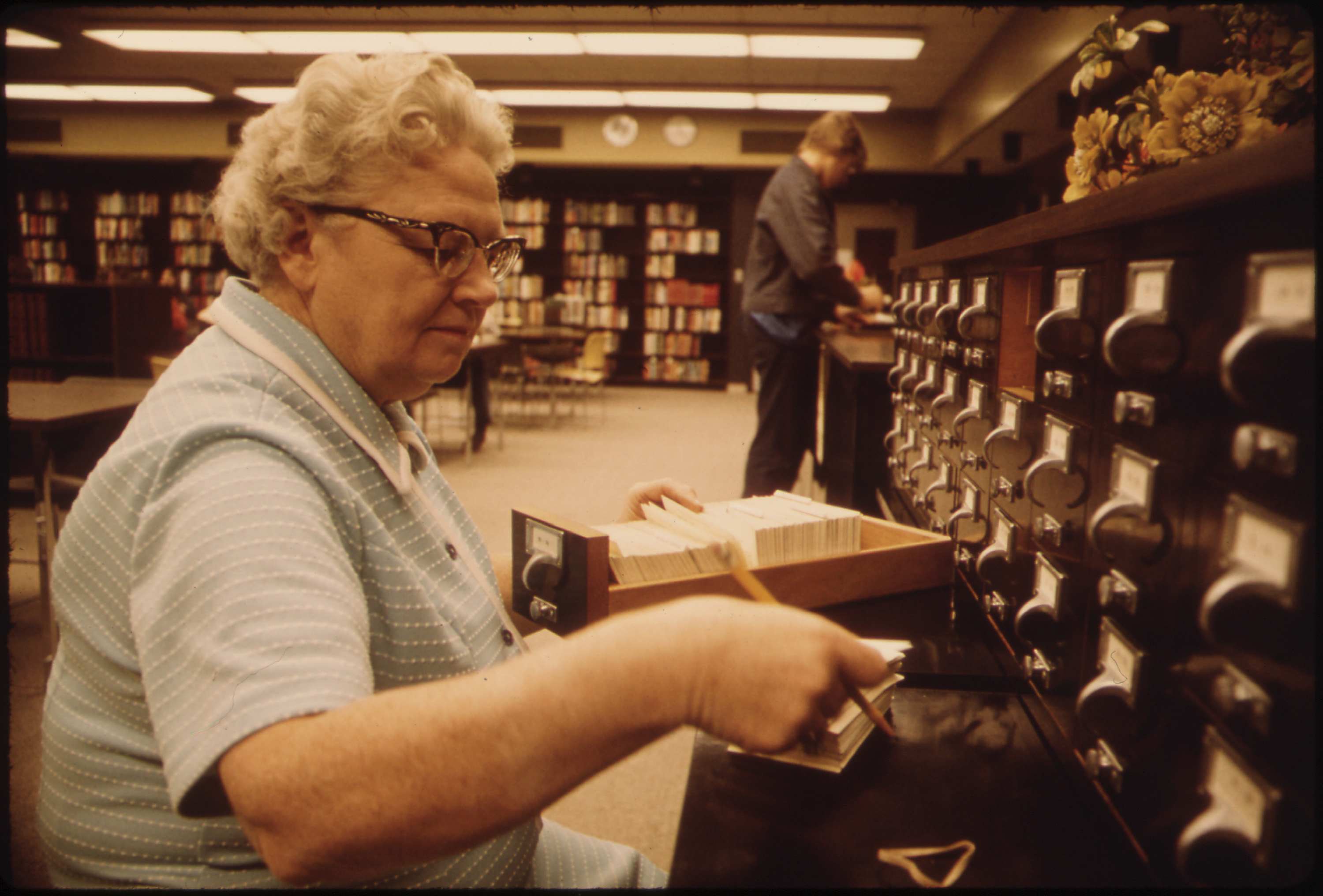 Librarian at the card files at a senior high school in New Ulm, Minnesota