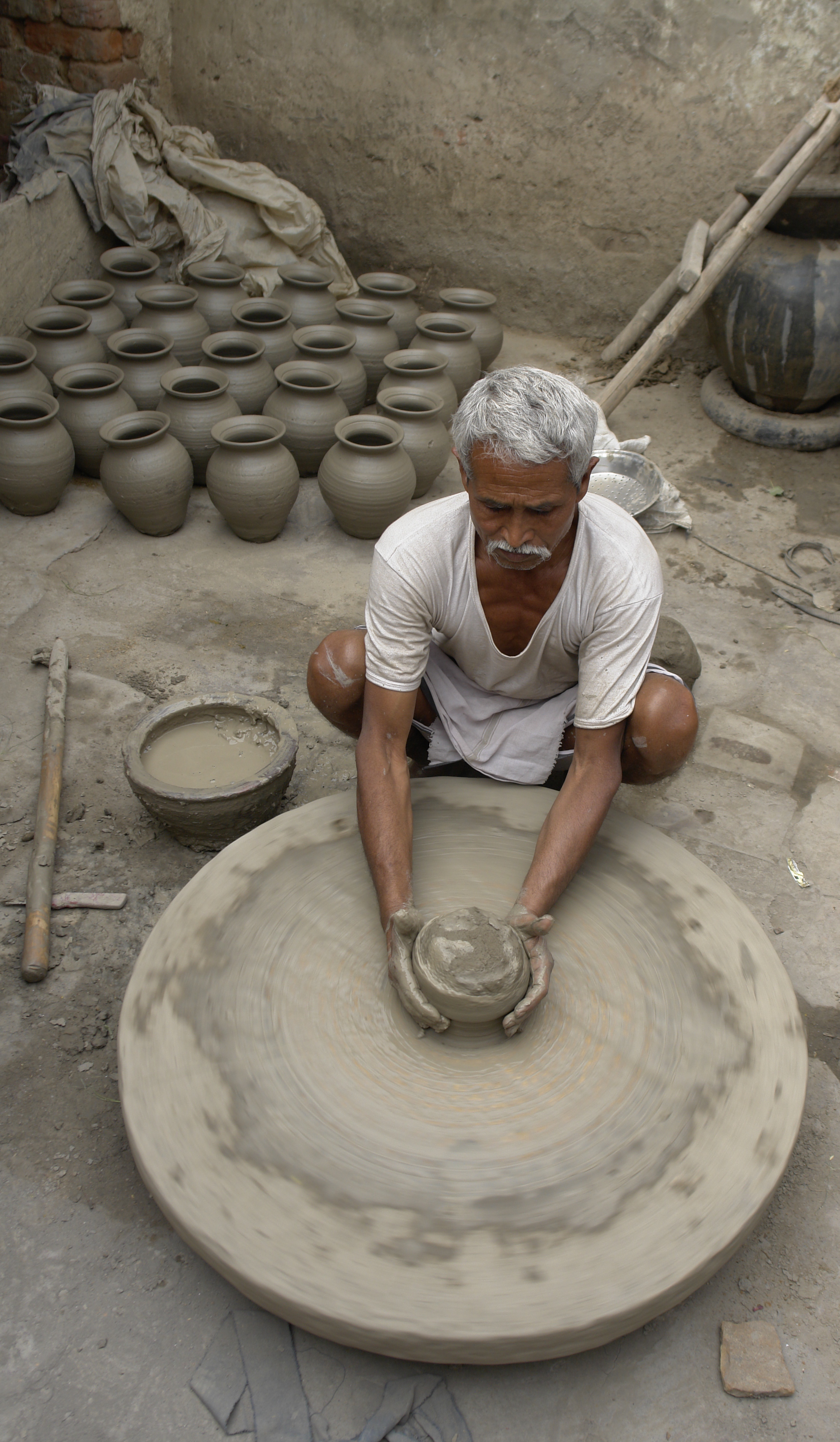 Potter at work, Jaura, India