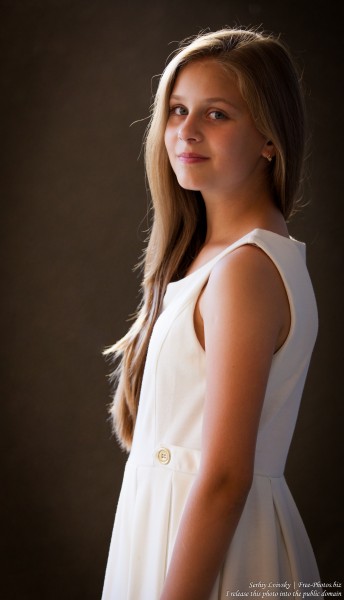 a 12-year-old blond girl wearing a white dress photographed in July 2015 by Serhiy Lvivsky, picture 5