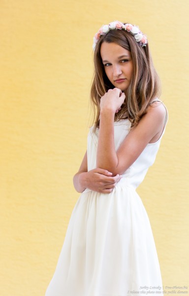 a 13-year-old Catholic girl in a white dress photographed in June 2015, picture 3
