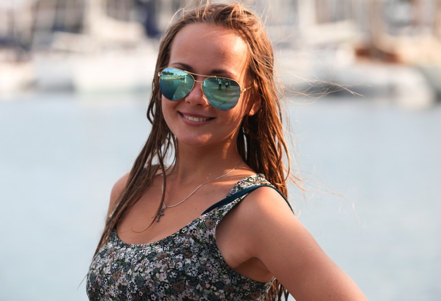 a beautiful girl wearing sunglasses, photographed in Barcelona, Catalonia, Spain in August 2013, portrait 9