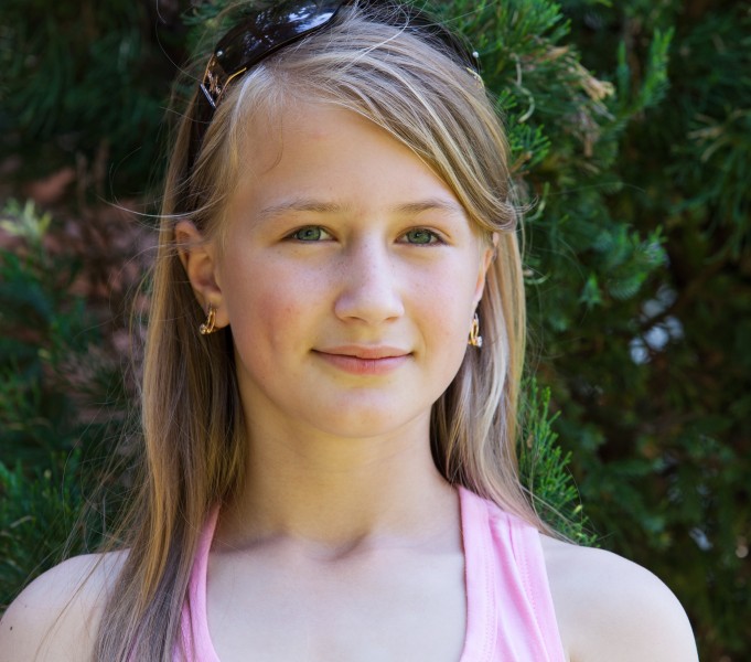 a blond girl of Catholic confession photographed in May 2014, portrait 12/21
