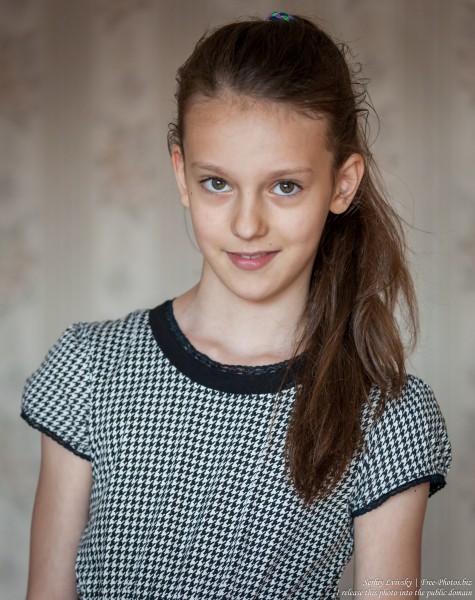 a brunette schoolgirl photographed in June 2016, picture 1