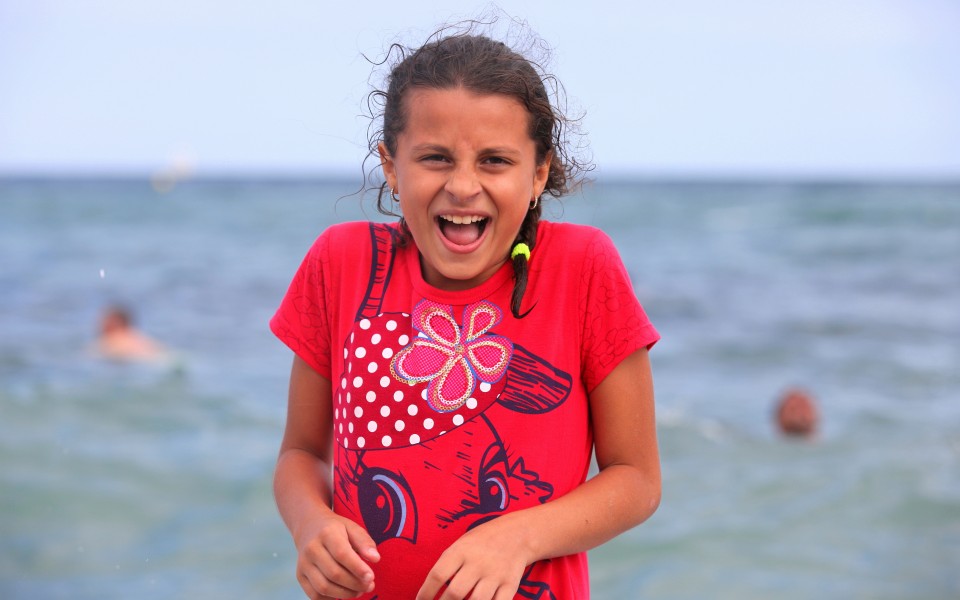 a cute brunette girl at a beach in Barcelona, August 2013, portrait 2