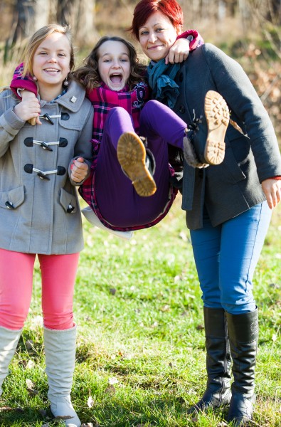 a cute Catholic schoolgirl having fun with her friend and mom in November 2013