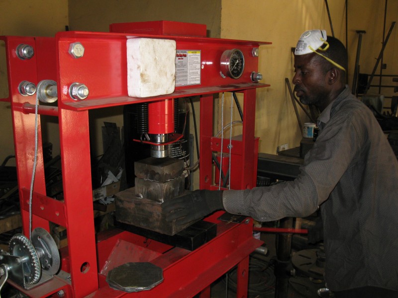 A Ghanaian Metal Fabricator at work