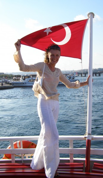 A beautiful Catholic girl with a Turkish flag