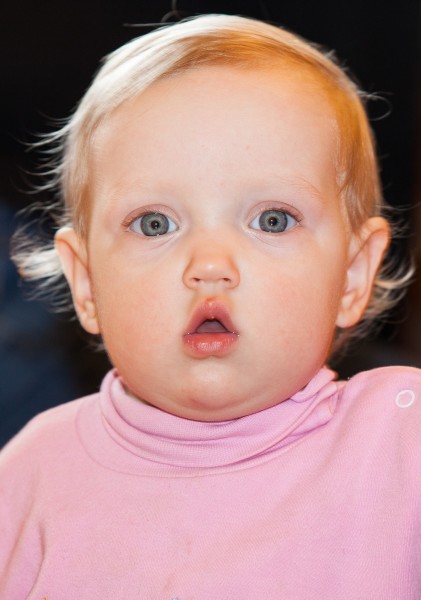 a one-year-old baby girl photographed in April 2014