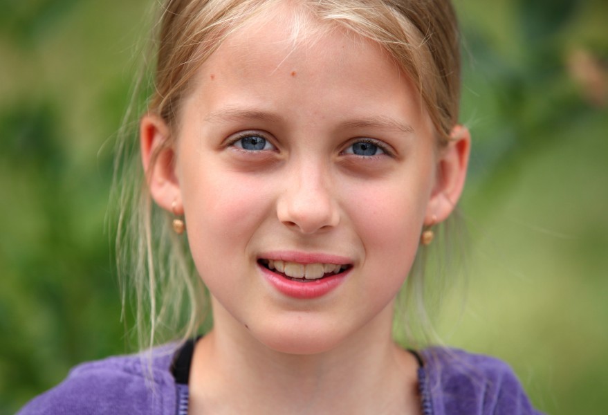 a beautiful sweet blond young Roman-Catholic girl in a Christian camp in July 2013, portrait 3/5