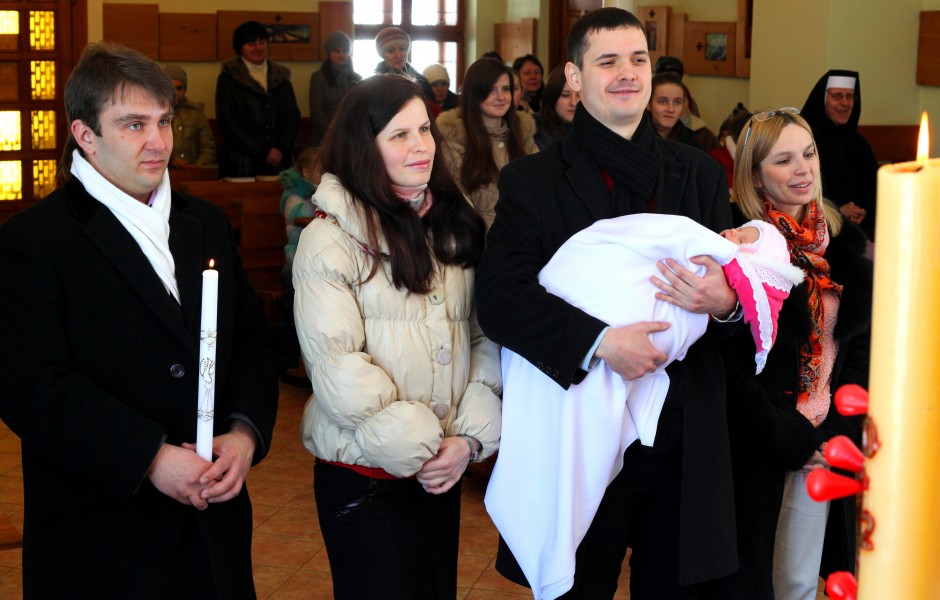 baptism of a baby girl in a Catholic church, picture 7